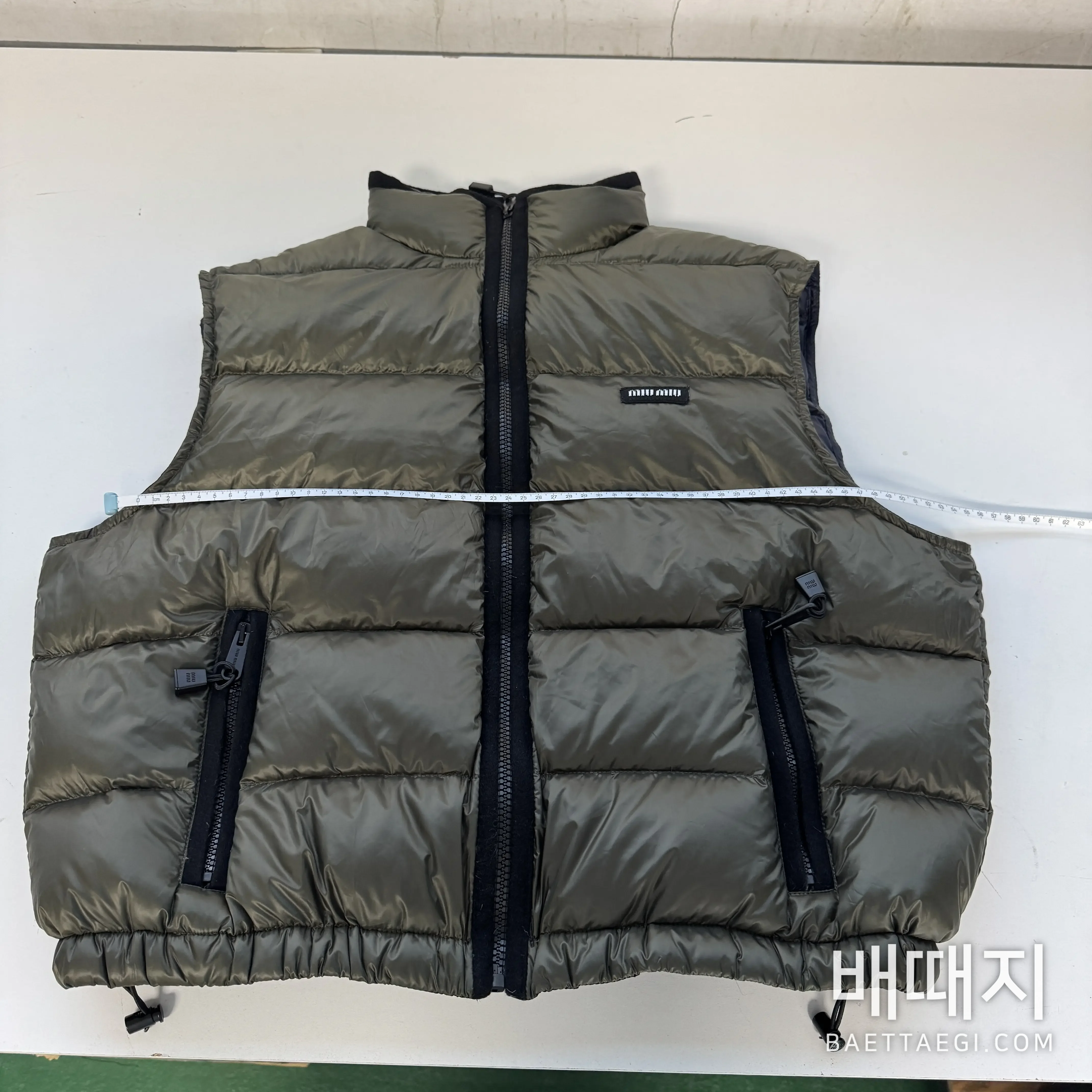 미우미우 로고 레터 다운 조끼 179702 검수사진 12