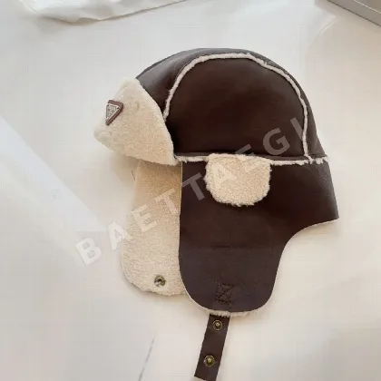 프라다 램스킨 가죽 이어머프 84874