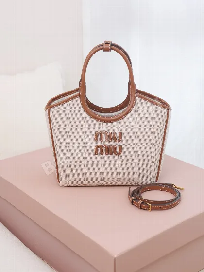 미우미우 소가죽 캔버스 토트백 5BA284M1180