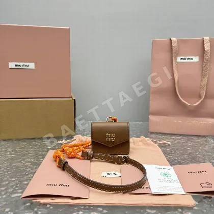 미우미우 오렌지 미니 스트랩 캔버스 이어폰 가방 68309