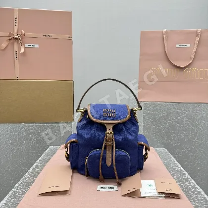 미우미우 파란색 캔버스 백팩 68428