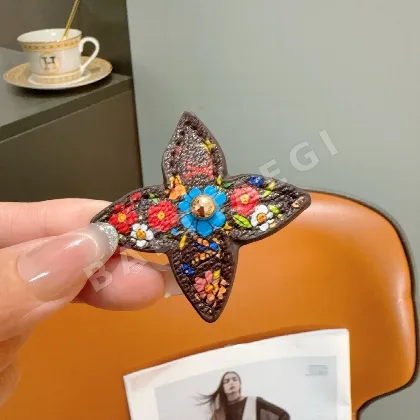 루이비통 모노그램 네잎클로버 헤어클립 184134