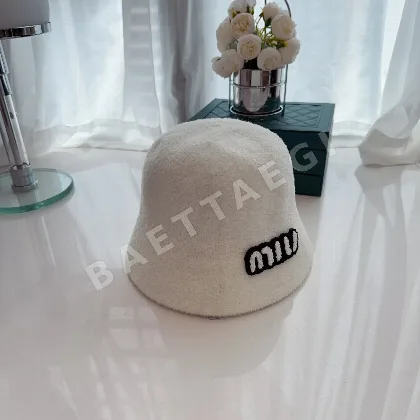 미우미우 테리 크로스 버킷햇 81134