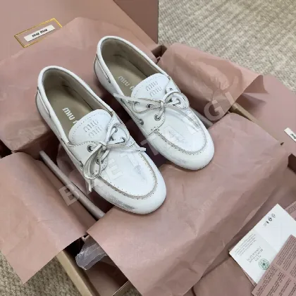 미우미우 레이스업 보트슈즈 94050