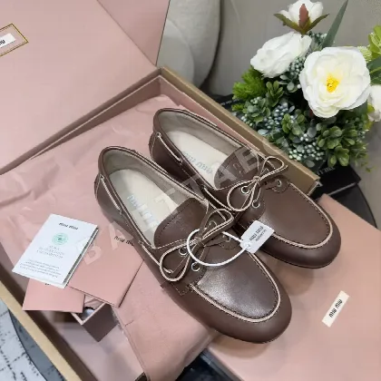 미우미우 레이스업 보트 슈즈 94173