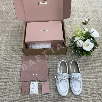 미우미우 레이스업 보트 슈즈 94147